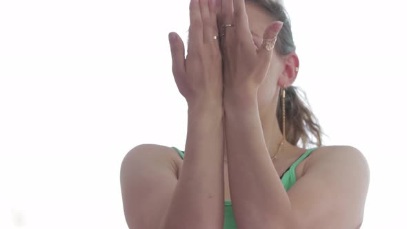 Woman Does Yoga in the Light Studio