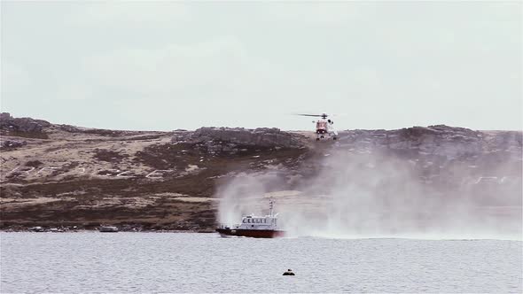 Helicopter and a Coast Guard Patrol Boat in the Falkland Islands (Malvinas).
