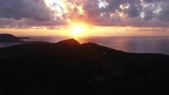 The Islands In Fiji Surrounded By The Calm Sea  With A Beautiful Sunset. -wide shot