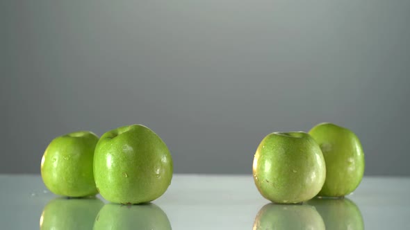 Man's Hand Takes the Glass with Apple Juce From the Table