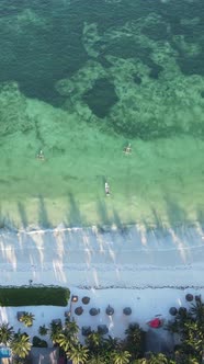 Vertical Video Boats in the Ocean Near the Coast of Zanzibar Tanzania