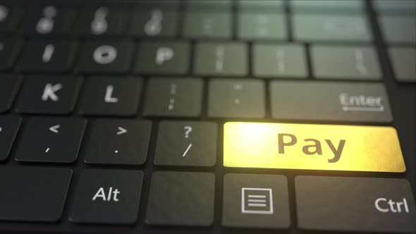 Black Computer Keyboard and Gold Pay Key alt