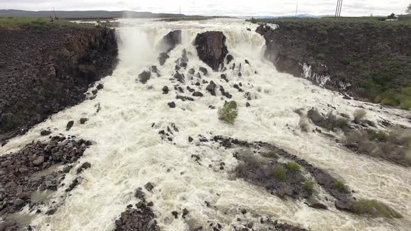 Aerial view of huge overflow waterfall at Magic Reservoir