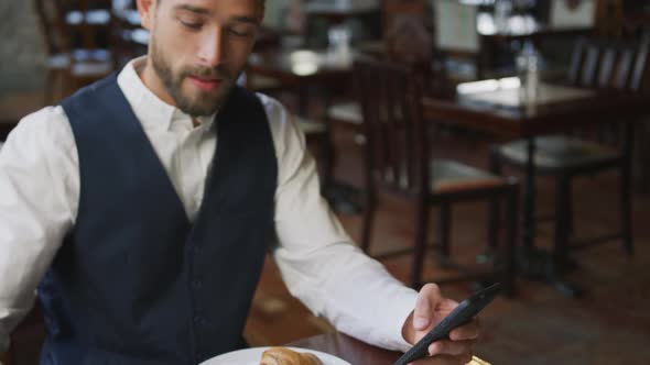 Young professional man in a cafe