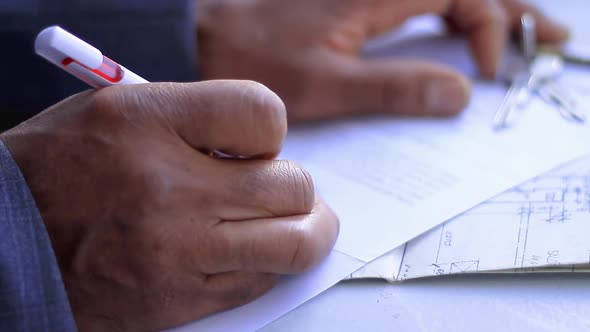 man signing a contract for a newly purchased house stock video stock footage