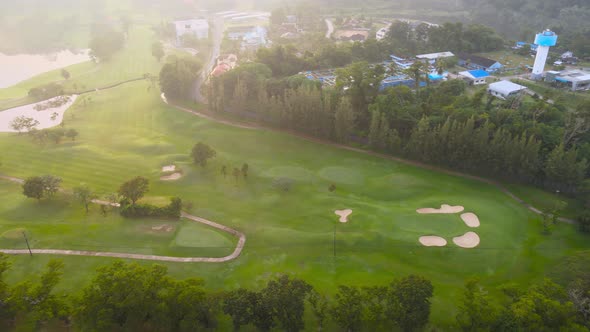 4K Aerial view Top-down view of Lawn Golf course in the morning or evening light, beautiful green