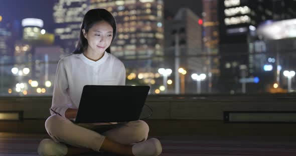 Business Woman Working on Laptop Computer at Outdoor