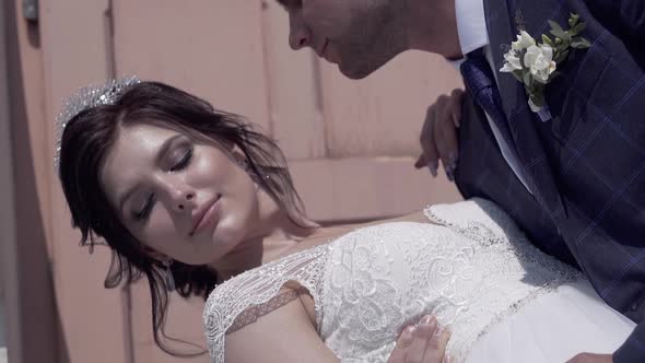 Wonderful Bride in Handsome Man Hands Slow Motion Closeup