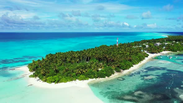 Aerial travel of luxury tourist beach wildlife by blue ocean with white sand background of a dayout 