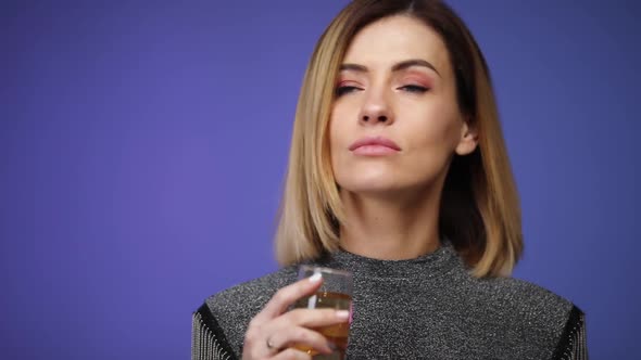 Closeup Beautiful Blonde Caucasian Woman Holding Glass of Champagne