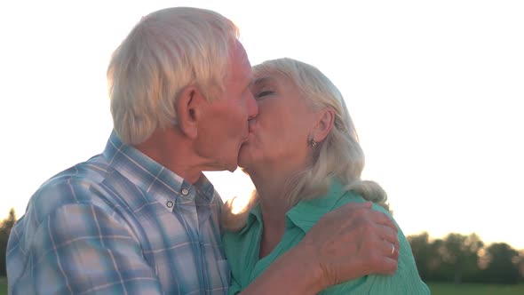 Senior Couple Kissing.
