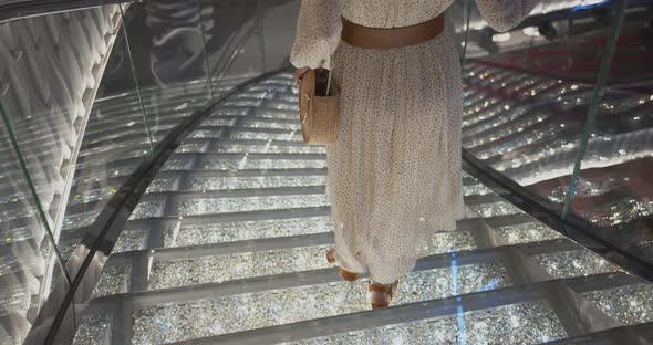 Young girl on the sparkling steps. Shot on Black Magic Cinema Camera