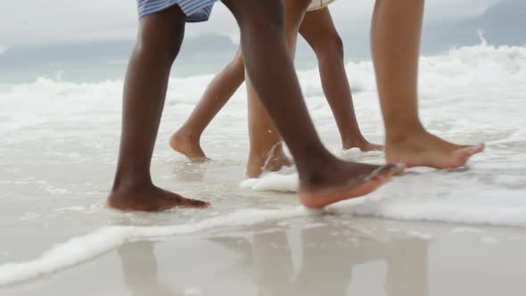 Family enjoying free time by the sea