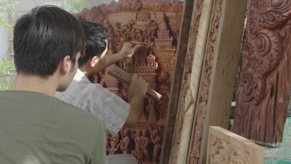 Carpenter Show To His Student How To Carve Wooden