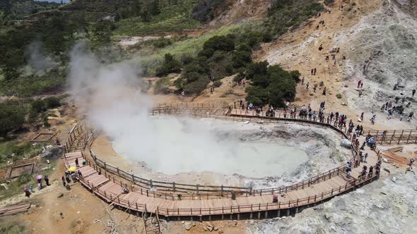 Aerial view of vulcano crater with sulfur vapor coming out of the sulfur marsh.