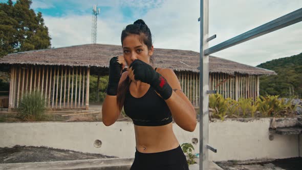 Woman Fighter Trains Her Punches Training Day in the Abandoned Hotel Strength Fit Body