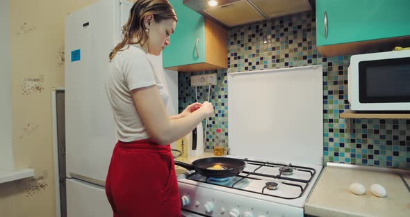 Woman Cooking Fried Eggs at Home Original Audio Included