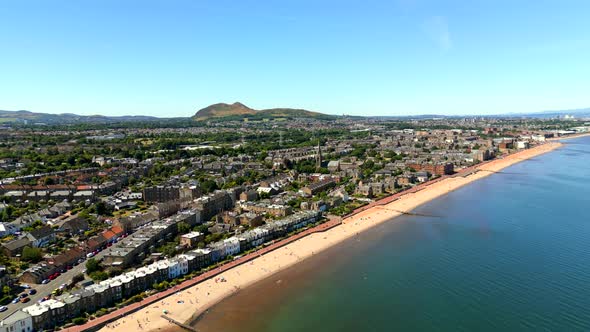 Aerial Flyover And Tilt Down Portobello Beach Edinburgh Scotland United Kingdom