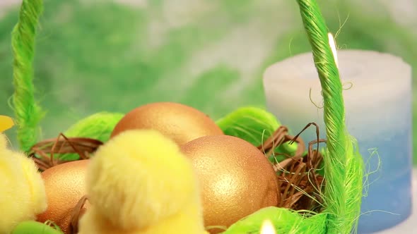 Golden Easter Eggs in Green Basket