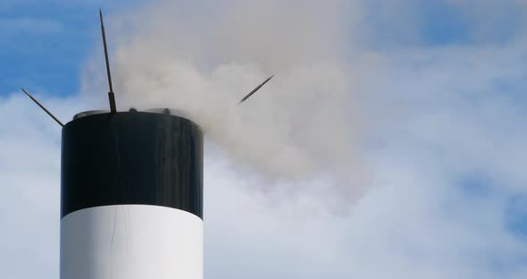 Smoke and air pollution from a chimney in France.