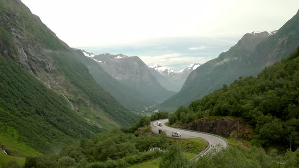 Vehicles Traveling The Rv15 Road Near Stryn Municipality In Sogn Og Fjordane, Norway. aerial