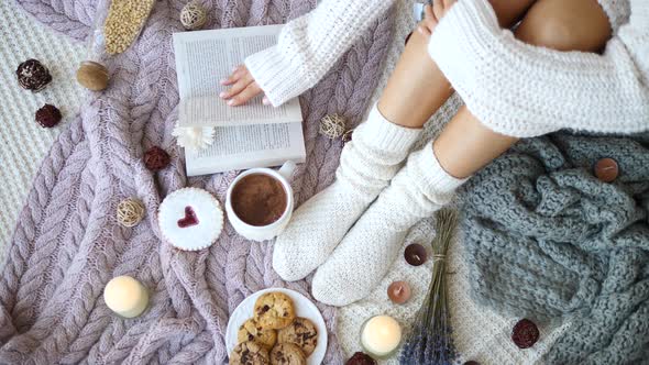 Cosy Winter Atmosphere With Knit Socks And Hot Chocolate