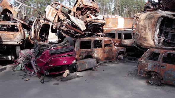 War in Ukraine a Dump of Shot and Burned Cars in Irpin Bucha District