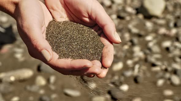 Releasing Sand from Hands