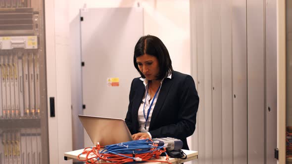 Technician working on laptop