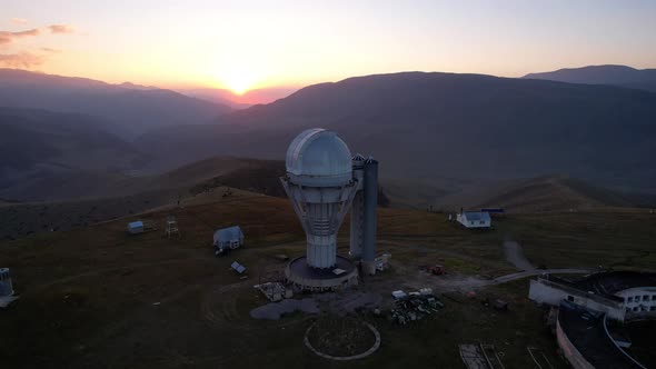 Two Large Telescope Domes at Sunset