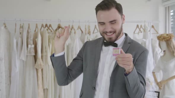 Funny Groom Man Wearing Wedding Clothes Dance in Dressing Room