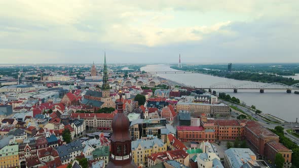 Drone is Flying Over the Streets of Riga Daugava River with Many Bridges