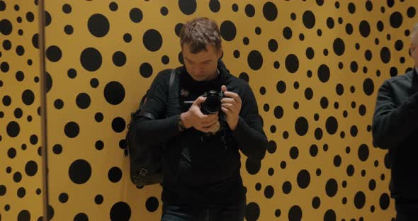 Visitors in Infinity Mirror Room of Japanese artist Yayoi Kusama