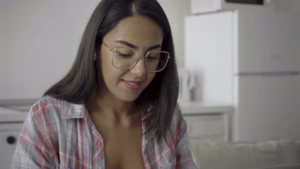 Close Up Shot of Beautiful Smiling Young Woman in Eyeglasses.