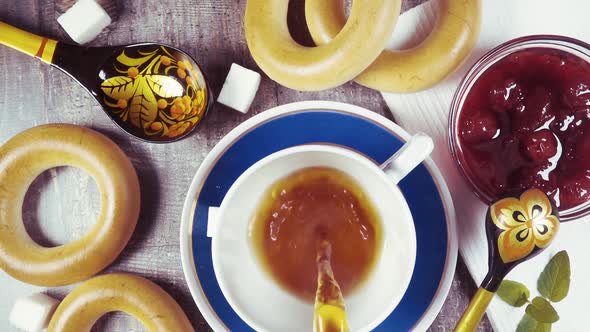 Slow Motion Traditional Russian Tea Party with Pastries Top View