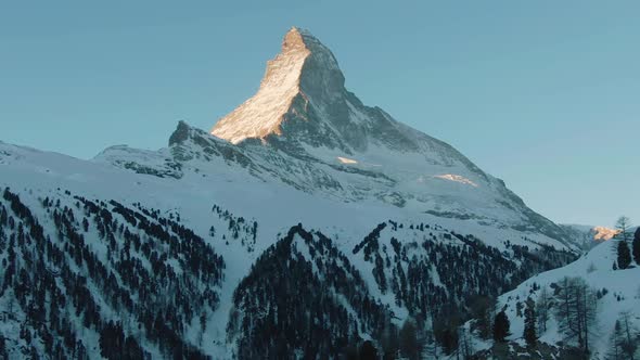 Matterhorn Mountain in Winter Sunny Morning at Sunrise Swiss Alps Switzerland Aerial View