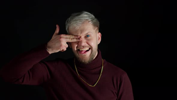 Stylish Man Pointing with Finger Gun Gesture Looking Confident Shooting Killing with Hand Pistol