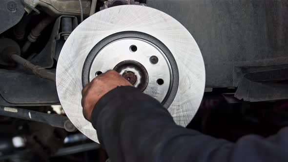 Car Brake Disk Replacement Repair In Workshop Garage