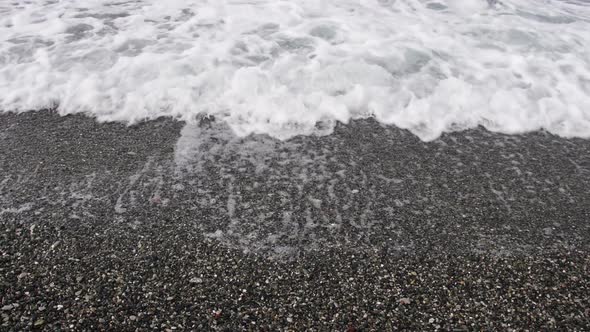 Sea Tide on a Pebble Shore