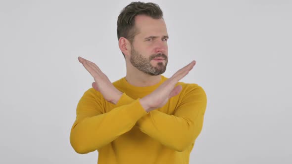 Portrait of Middle Aged Man Showing No Sign By Arms Crossed