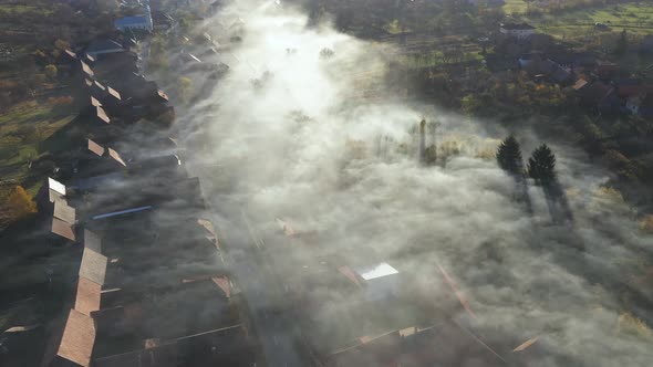 High Angle View of Early Morning Haze Over a Village