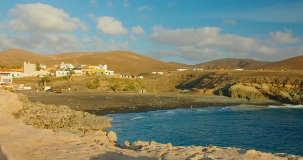 Spain Canary Islands Fuerteventura Sandy Volcanic Beach in Little Town Ajuy