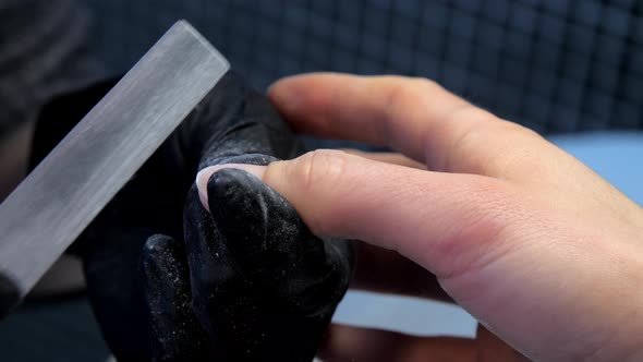 Professional Manicurist Makes Square Form of Fingernails