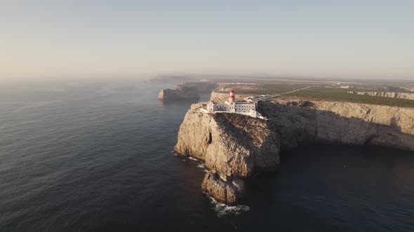 Aerial seascape of touristic Cabo de San Vicente cape saint Vincent lighthouse in Sagres Portugal.