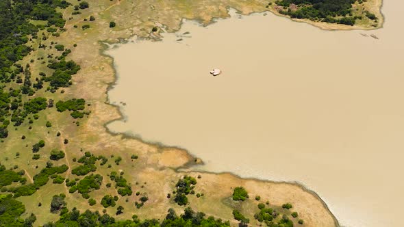 Tropical Landscape with a Lake