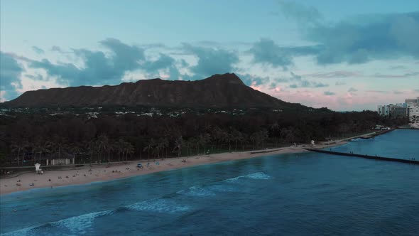 Aerial drone footage of Honolulu, Hawaii. Beautiful real estate, buildings in the city. Palm trees