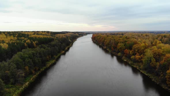 Aerial View. Flying Over the River. Beautiful Autumn Day