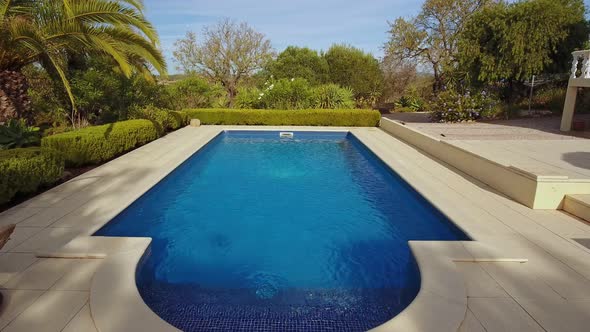 Luxurious Swimming Pool Near the Residence with a Garden with Clear Water for Tourists