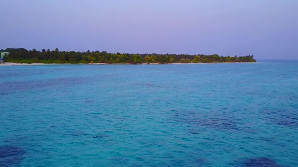 Aerial landscape of bay beach by blue ocean with sand background