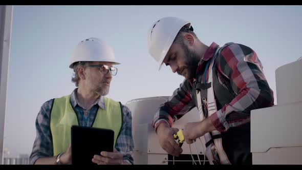 Engineers Working on 5g Antenna